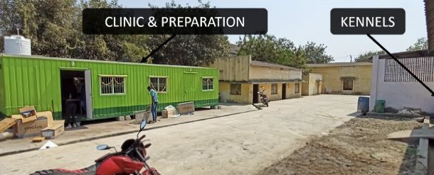 The outside of a clinic built into a shipping container.