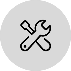 Grey tools icon of crossed screwdriver and wrench.