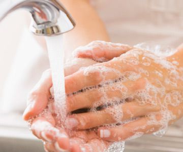 Woman washing hands