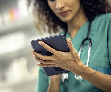 Veterinarian learning on iPad